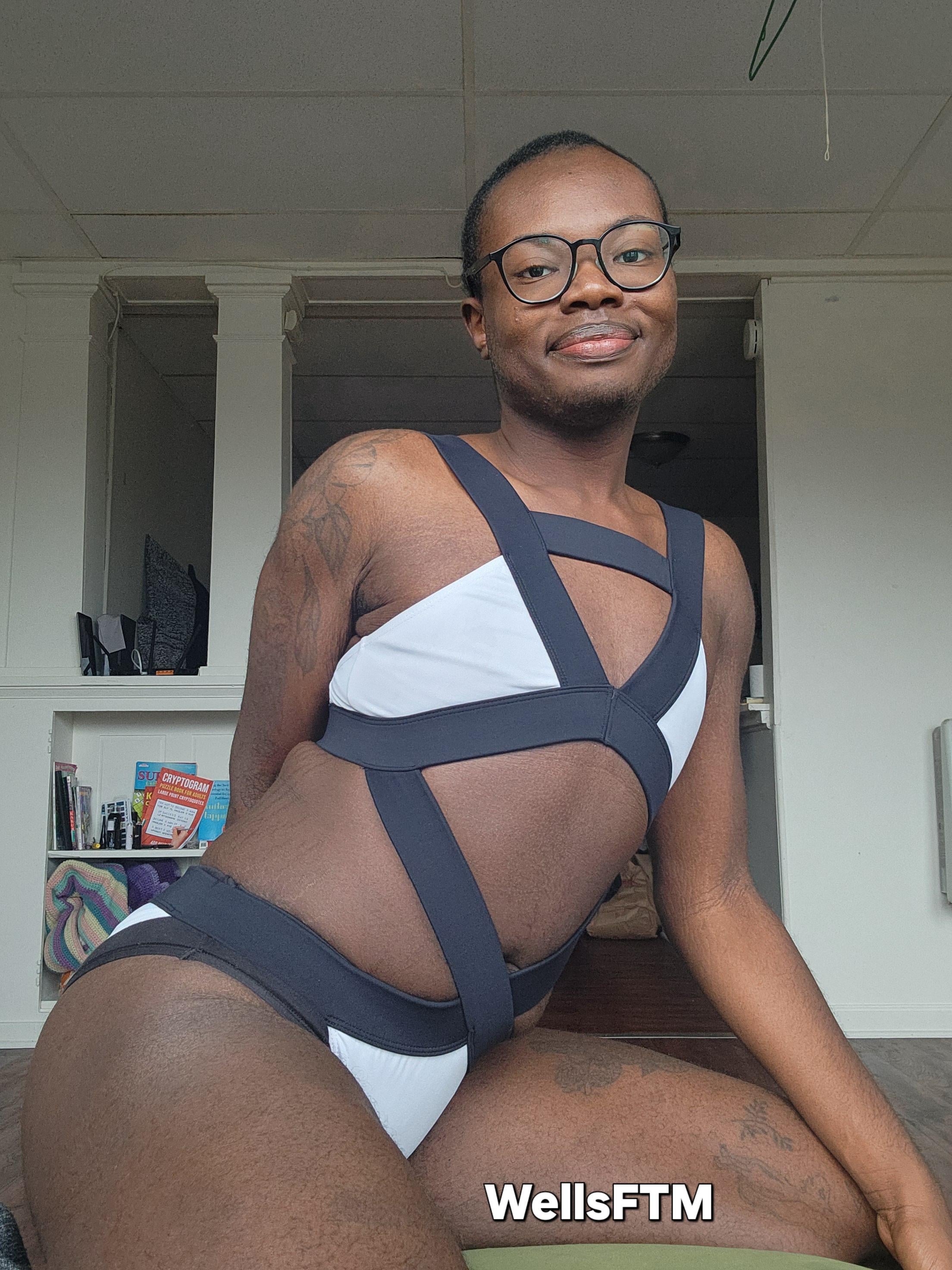 I love how this swimsuit looks like bondage gear